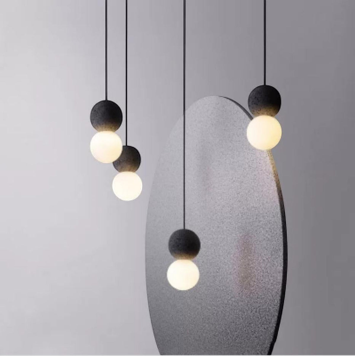 LYS Betongpendel – liten kulelampe på snor