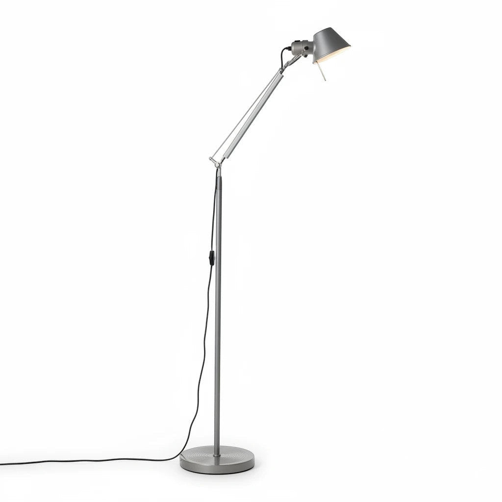 Lysverden adjustable silver aluminum floor lamp with a tilting head and articulated arm for focused task lighting.