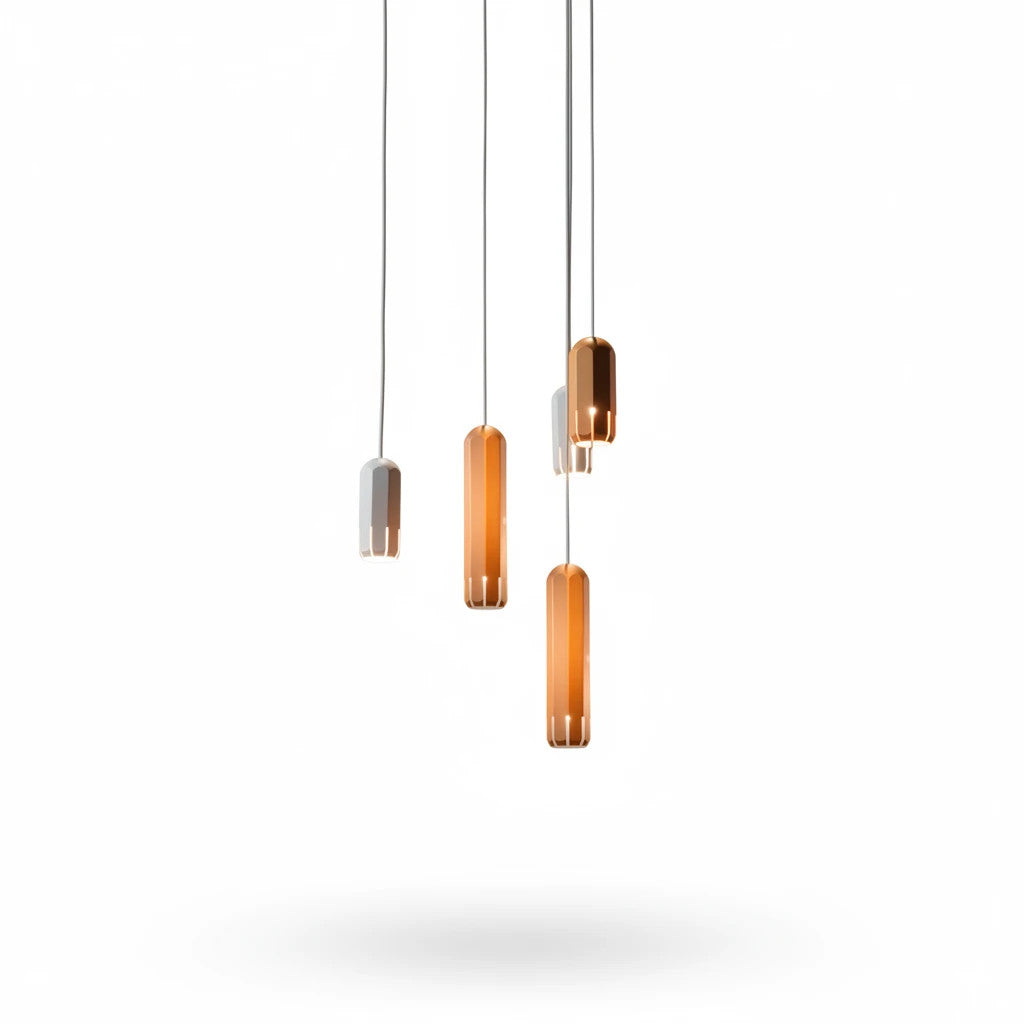 Lysverden minimalist aluminium tube pendant lights in gold and grey hanging in a cluster for modern interior lighting