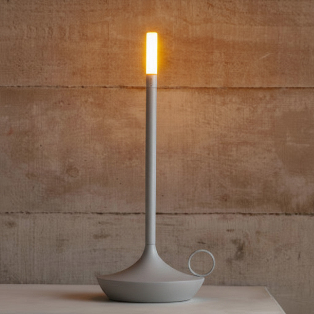 Lysverden grey aluminum cordless candle-style table lamp with touch dimming and warm LED light.