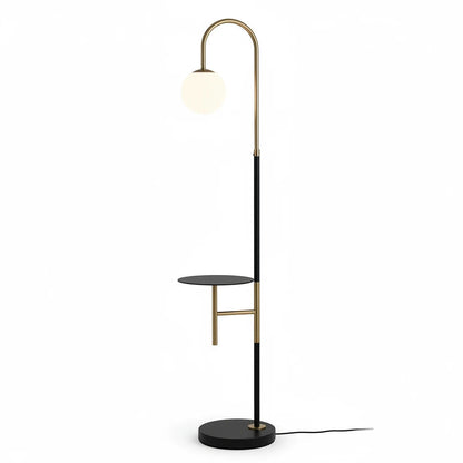 Lysverden modern arched floor lamp in black and gold with an opal glass globe shade and integrated side shelf.
