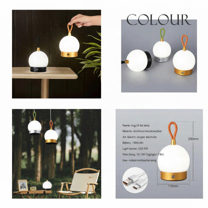 Lysverden ball-shaped camping lantern with gold base, white acrylic shade, and orange leather loop handle. Touch-controlled, dimmable.