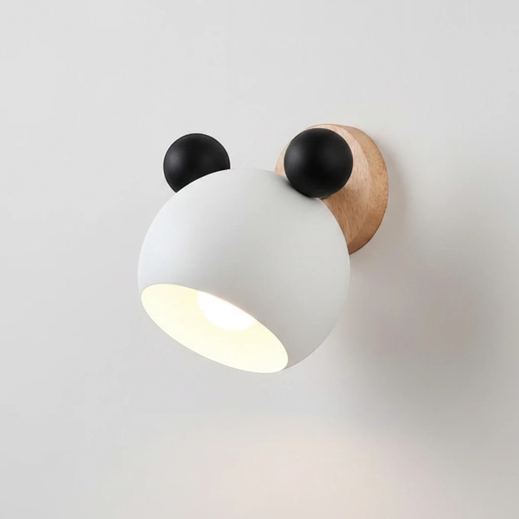 Lysverden white and black bear-shaped LED wall lamp with a natural wood base for a cozy nursery atmosphere.