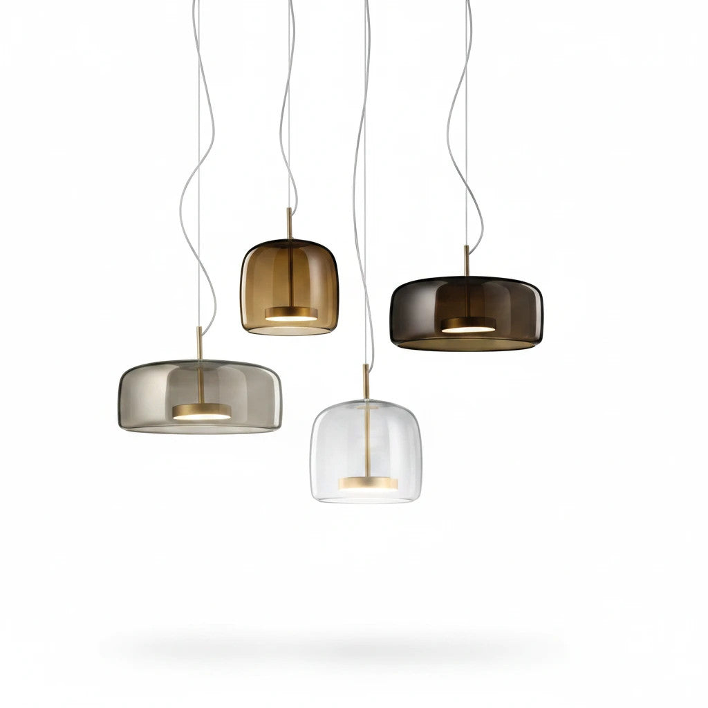 Lysverden bell-shaped glass pendant lights in amber, smoke grey, and clear glass with metallic accents