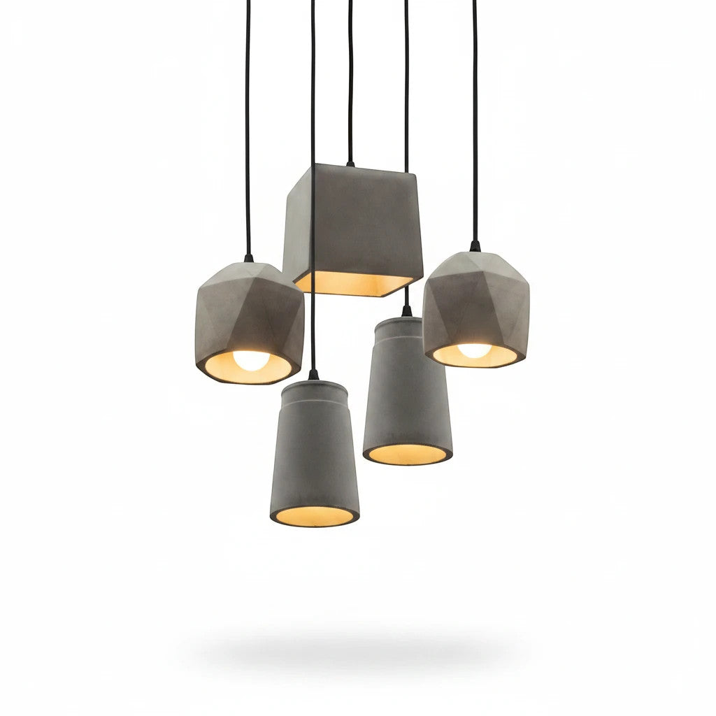 Lysverden BETONG industrial pendant light cluster with five grey cement shades providing warm downward lighting.