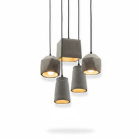 Lysverden BETONG industrial pendant lamp cluster with five grey cement shades providing warm downward lighting