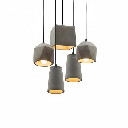 Lysverden BETONG industrial pendant light cluster with four grey cement shades providing warm downward lighting