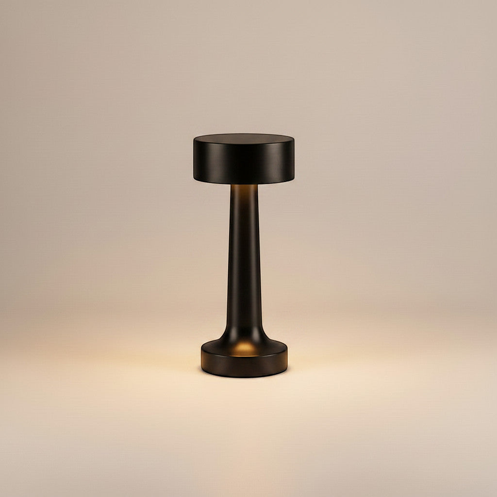 Lysverden black brushed aluminum cordless table lamp with disc top, 4 color temperatures, and Qi charging.
