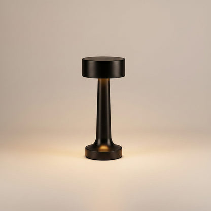 Lysverden black brushed aluminum cordless table lamp with disc top, 4 color temperatures, and Qi charging.
