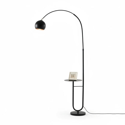 Lysverden black arched floor lamp with a glass dome shade and integrated side table on a sturdy base.