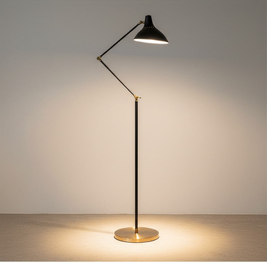 Lysverden minimalist black floor lamp with a tilting shade and elegant brass base for modern living room lighting