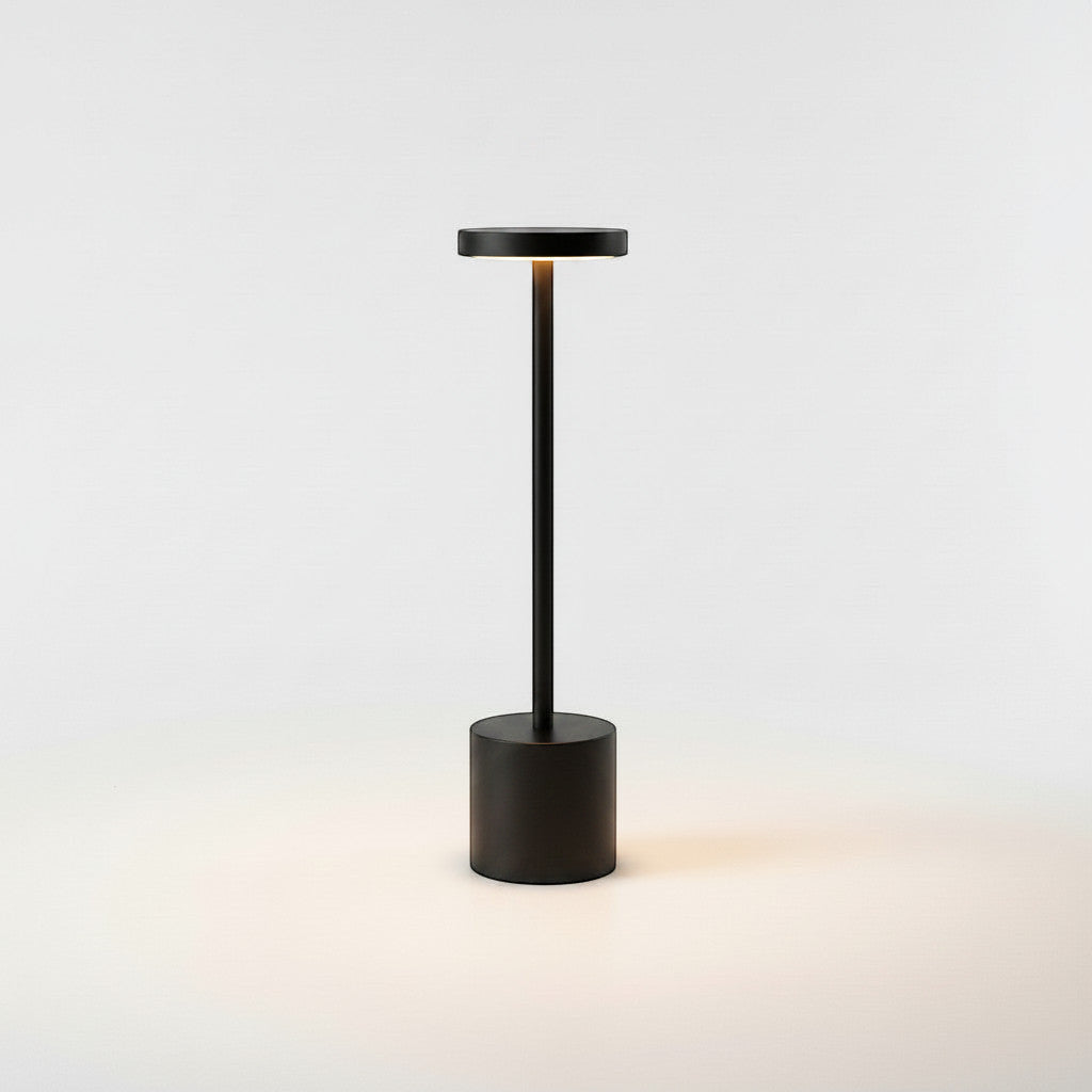 Lysverden black cordless disc-top table lamp with round base, touch control, and 3-level dimming.