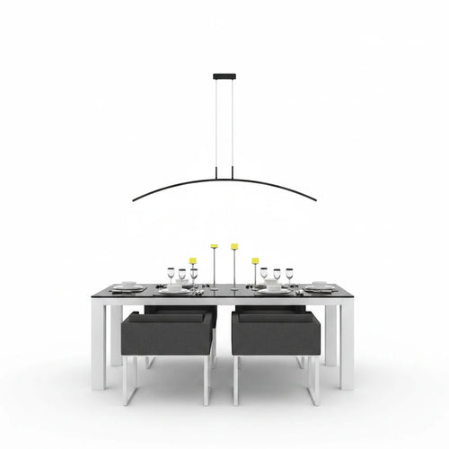 Lysverden black curved LED pendant light hanging over a modern dining table with chairs in a minimalist setting