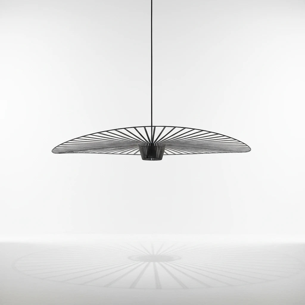 Lysverden large black flat disc pendant lamp with ribbed fiber design creating a decorative shadow effect