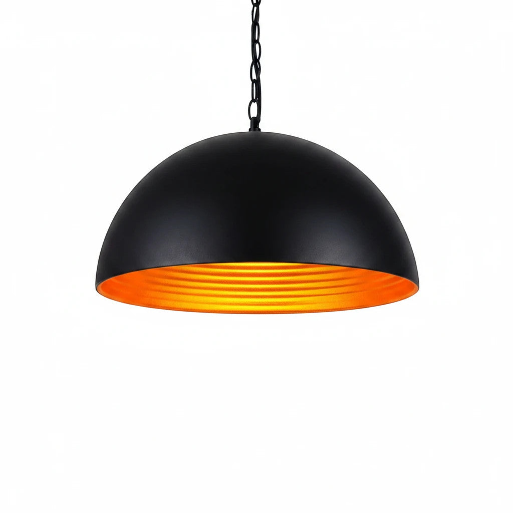 Lysverden matte black metal dome pendant lamp with a reflective gold interior for warm lighting