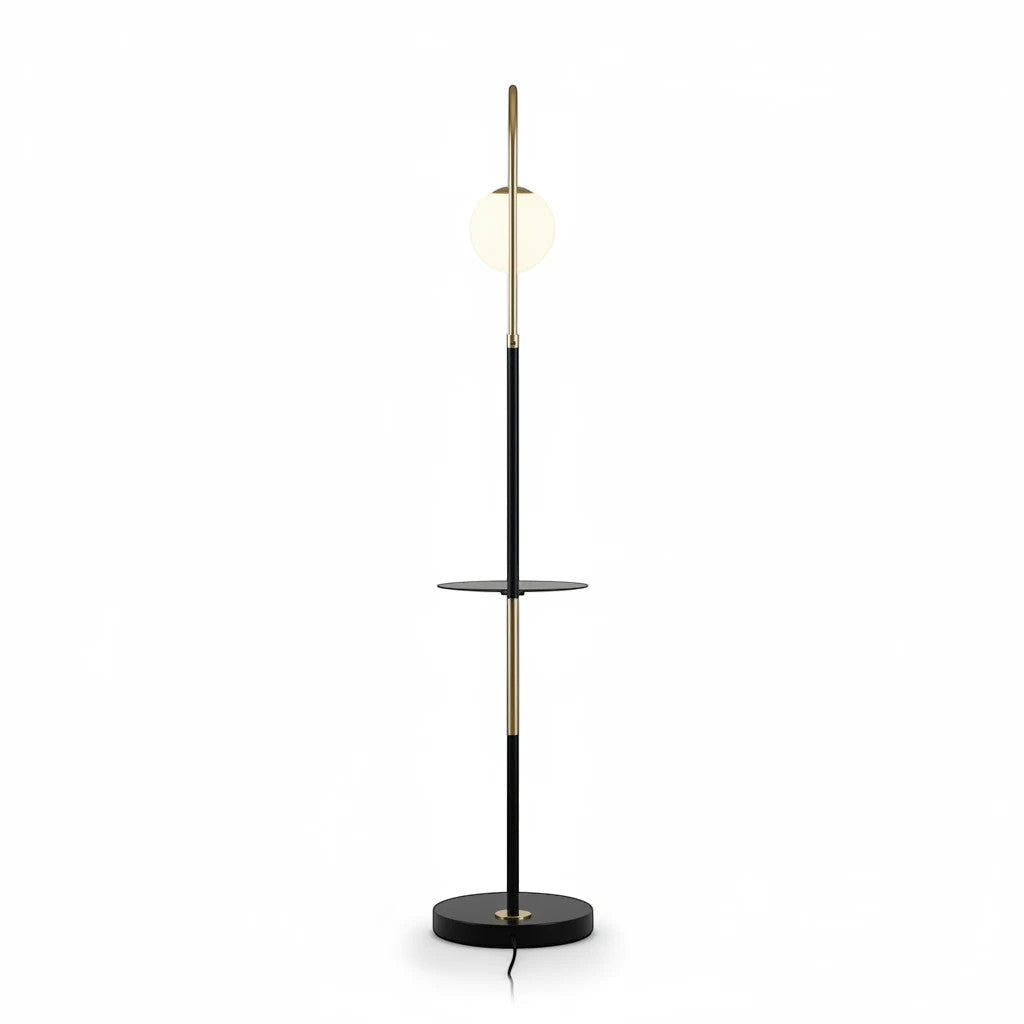 Lysverden floor lamp with a black and gold metal frame, opal glass sphere, and integrated shelf on a white background.
