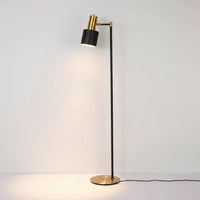 Lysverden classic floor reading lamp with a black and gold finish, featuring an adjustable shade and round brass base.