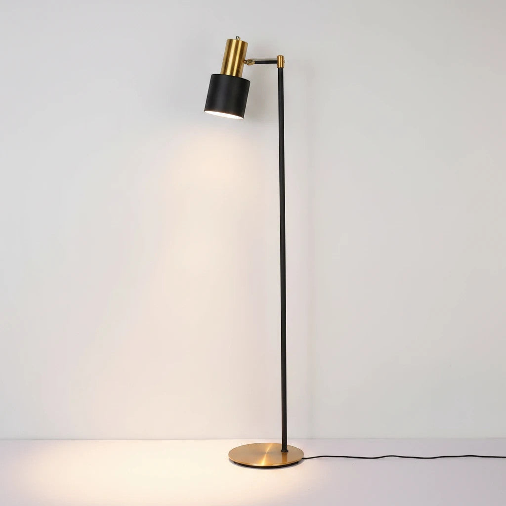 Lysverden classic floor reading lamp with a black and gold finish, featuring an adjustable shade and round brass base.