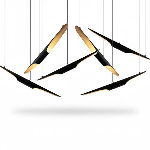 Lysverden modern cluster pendant light with black slanted metal tubes and warm gold interior finish
