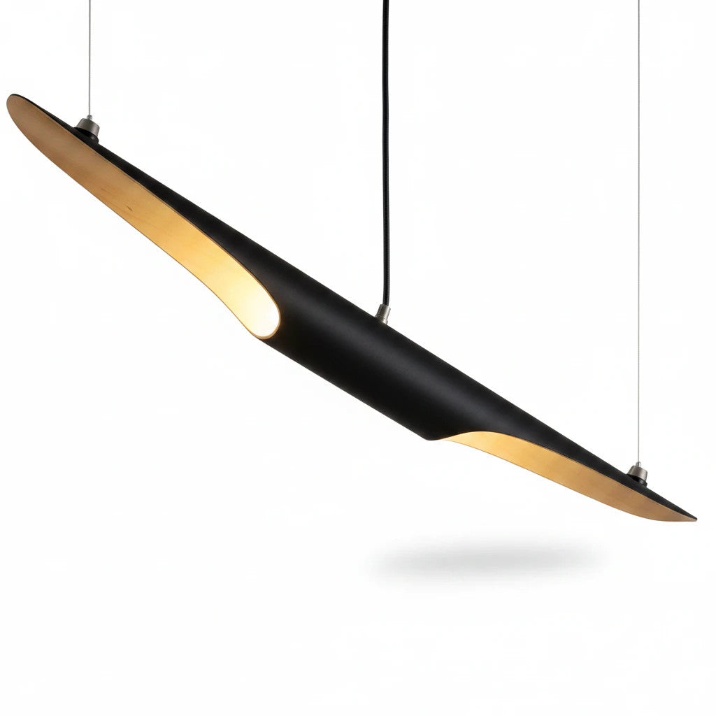Lysverden modern pendant light with a sleek black exterior and warm gold interior, featuring a unique slanted tube design.
