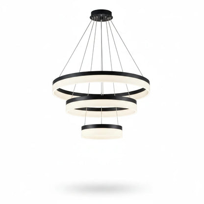 Lysverden modern LED chandelier with three concentric black metal rings and warm white acrylic light diffusers.