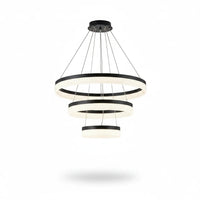 Lysverden modern LED chandelier with three concentric black and white rings providing warm, glare-free lighting.