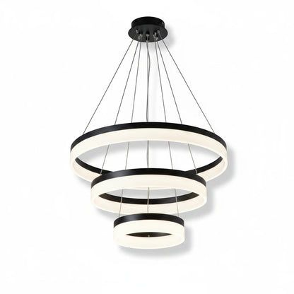 Lysverden modern LED chandelier with three concentric black metal rings and warm white acrylic diffusers.
