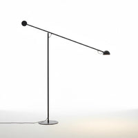 Lysverden minimalist black metal floor lamp with a long cantilever arm for focused lighting in modern interiors.