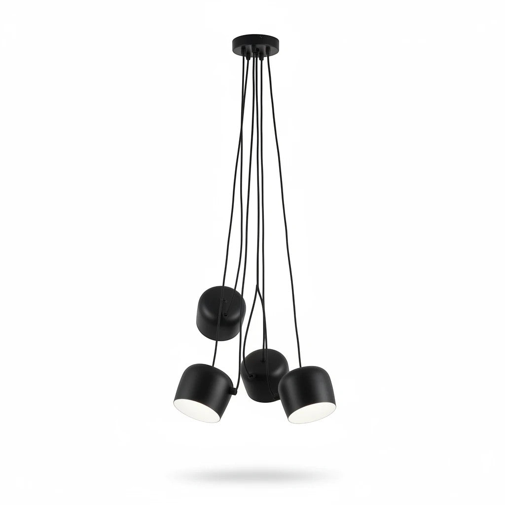 Lysverden black metal drum pendant cluster with four adjustable spotlights for modern industrial interior lighting.