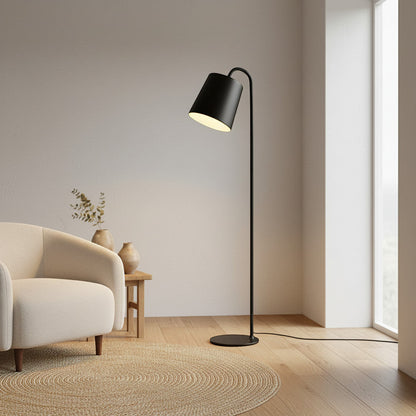 Lysverden black metal floor lamp with cone shade and integrated LED in a minimalist Scandinavian living room