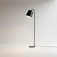 Lysverden black metal floor lamp with a conical shade and integrated LED light, featuring a minimalist Scandinavian design.