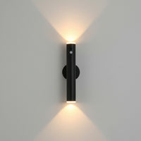 Lysverden black metal wall lamp with up/down light, remote control, and magnetic mount. Includes gold remote.