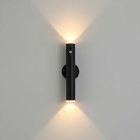 Lysverden black metal wall lamp with up/down light, remote control, and magnetic mount. Includes gold remote.
