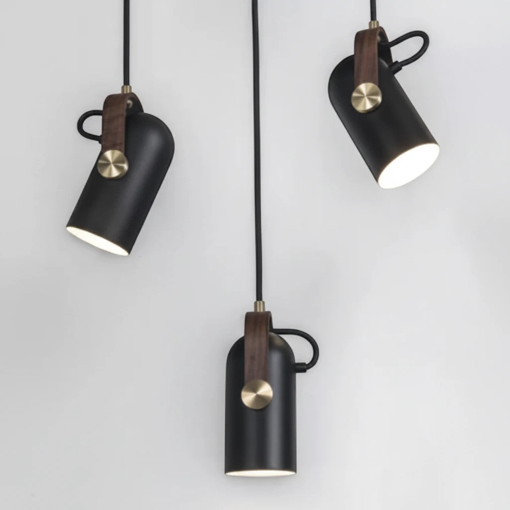 Lysverden matte black metal pendant spotlights with wood accents and brass details in a Nordic retro design