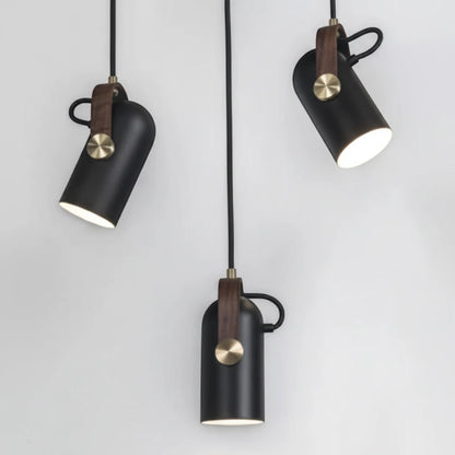 Lysverden matte black metal pendant spotlights with wood accents and brass details in a Nordic retro design