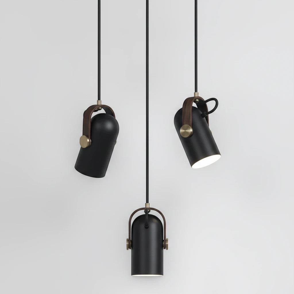 Lysverden matte black metal pendant spotlights with wood accents and brass details in a Nordic retro design.