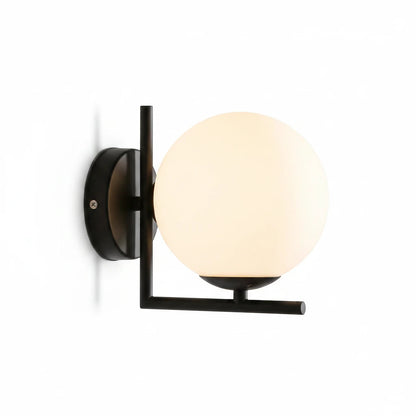 Lysverden modern wall lamp with a round opal glass globe and a minimalist black iron frame for soft ambient lighting.