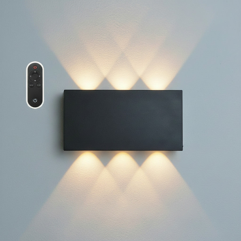 Lysverden sort rektangulær LED-vegglampe med opp-/nedlys, fjernkontroll og 5200 mAh batteri.