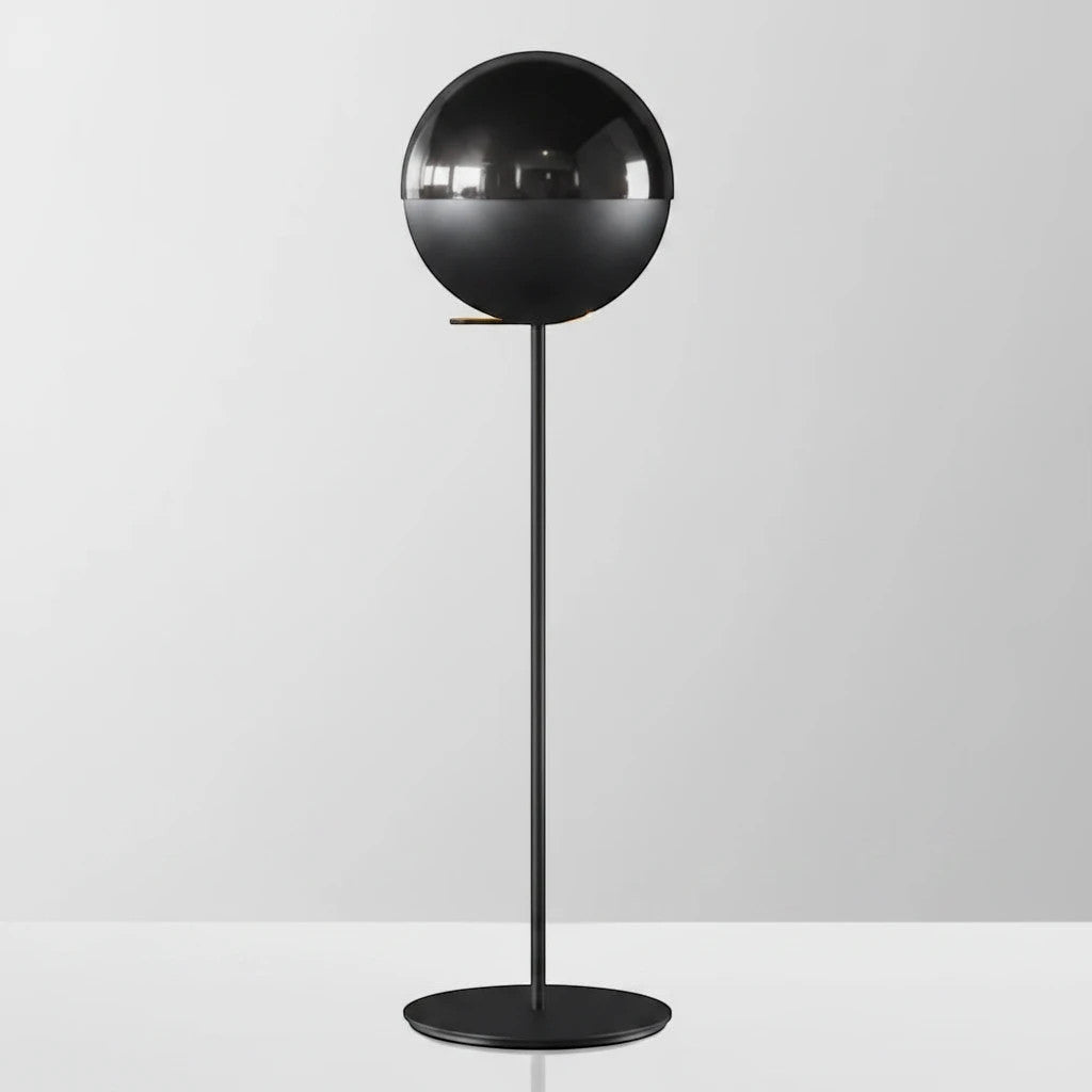 Lysverden floor lamp with a modern black spherical glass shade and slim metal stand for elegant ambient lighting.