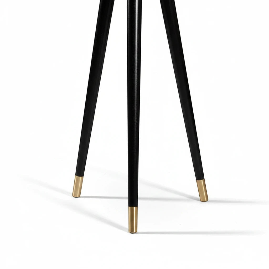 Lysverden tripod lamp legs in black with elegant gold-toned metal tips on a white background