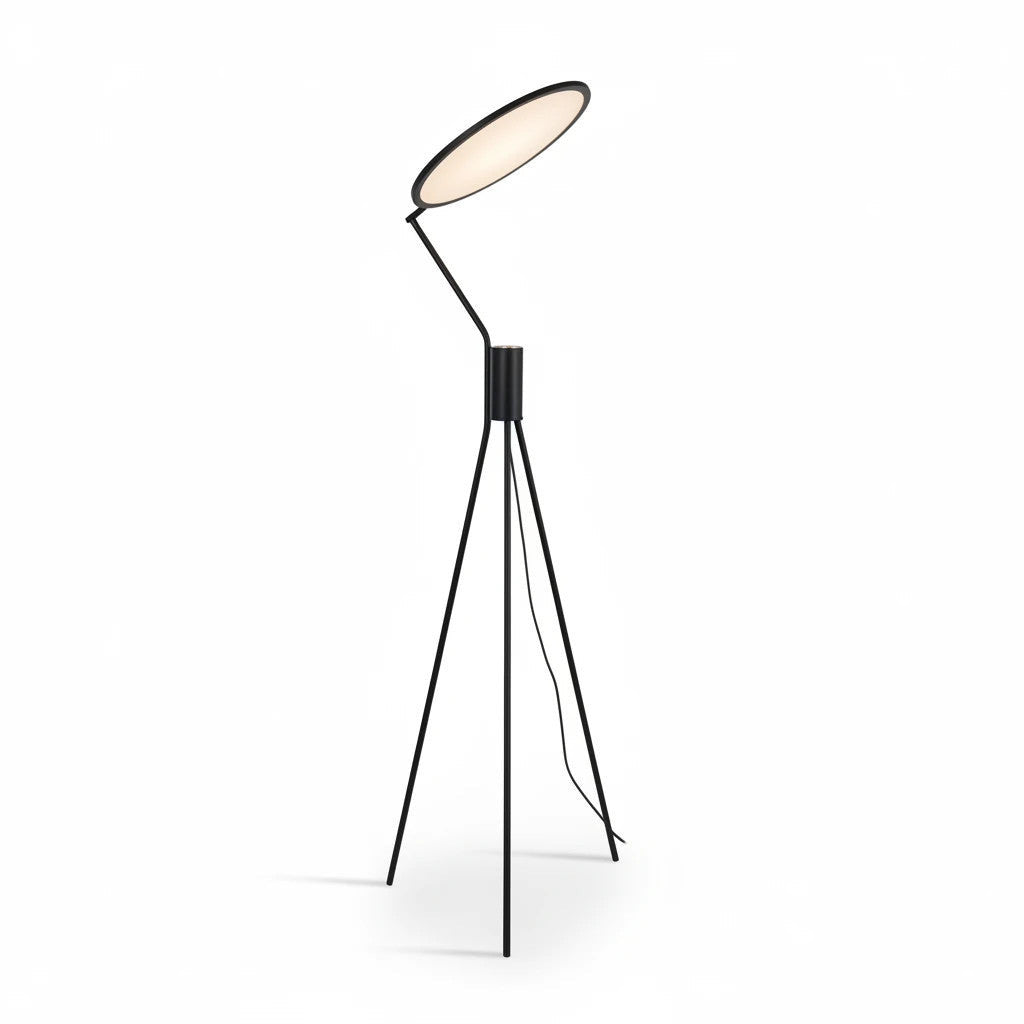 Lysverden minimalist black tripod floor lamp with an adjustable circular LED uplight head for indirect warm lighting.