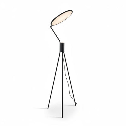 Lysverden minimalist black tripod floor lamp with an adjustable circular LED uplight head for indirect warm lighting.