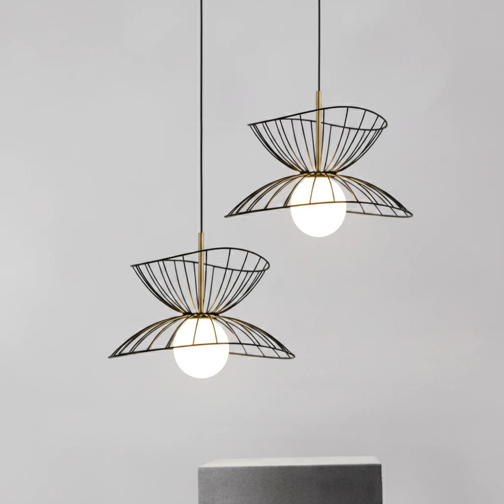Lysverden modern black wire pendant lights with double bowl design and glowing opal glass spheres in a pair