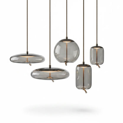 Lysverden BOBLE pendant lights in smoke-colored mouth-blown glass with organic shapes and metallic details.