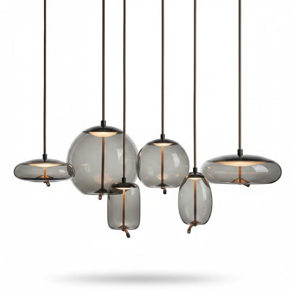 Lysverden BOBLE pendant light cluster with organic, mouth-blown smoke-grey glass shades in various shapes and sizes.