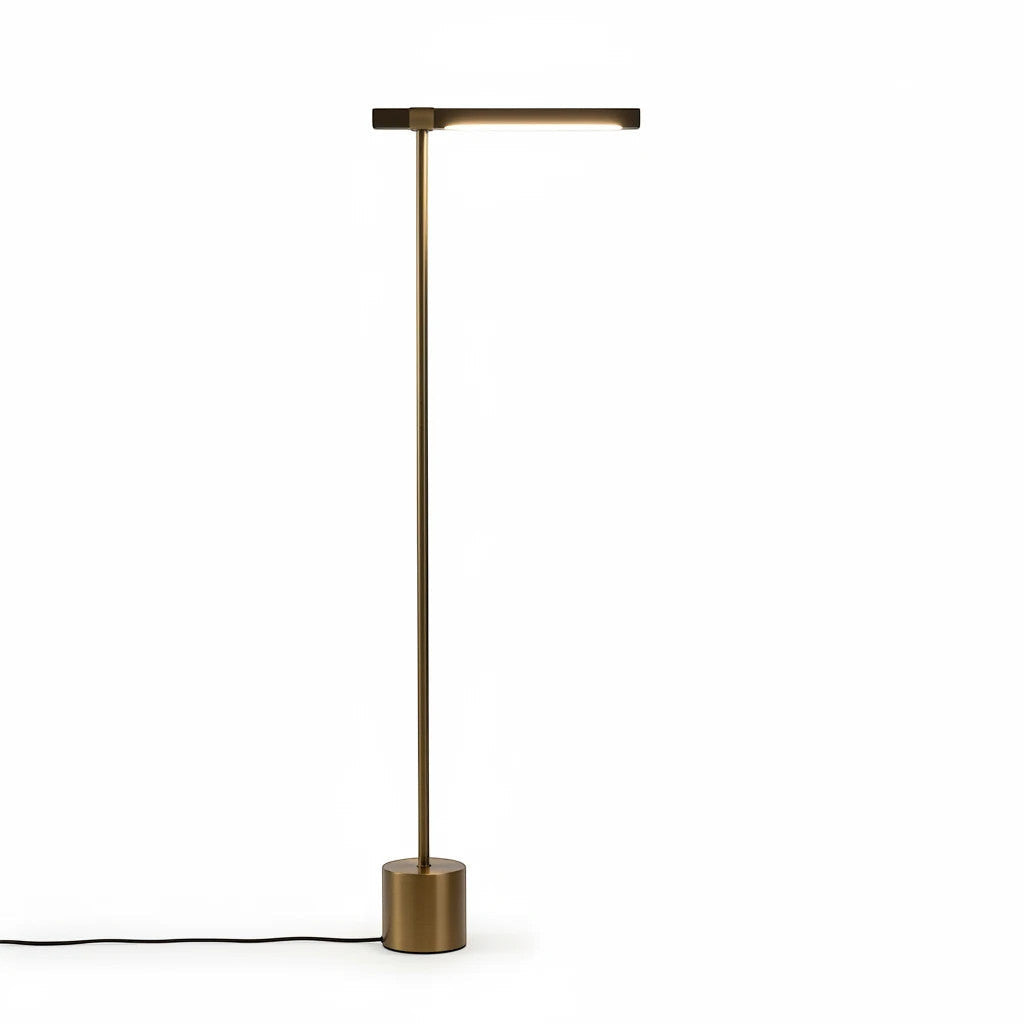 Lysverden minimalist floor lamp with a brass finish and integrated LED light bar on a solid cylindrical base