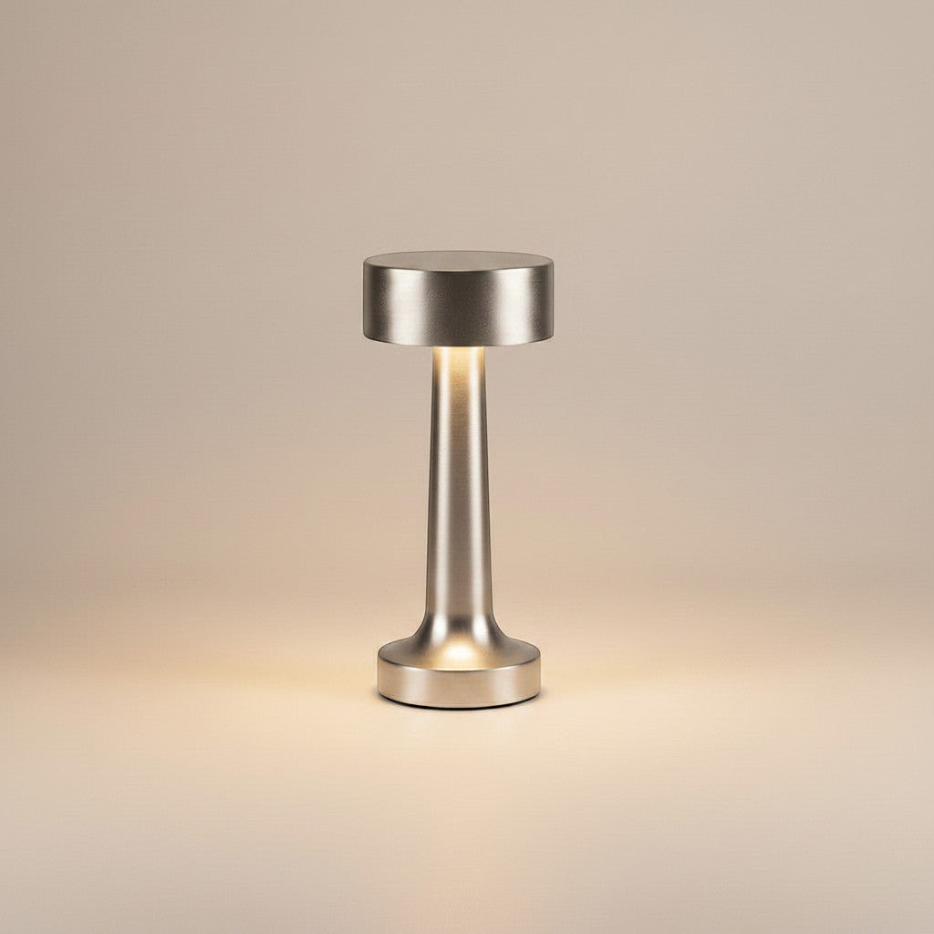 Lysverden brushed aluminum cordless disc-top table lamp with 4 color temperatures and Qi charging.