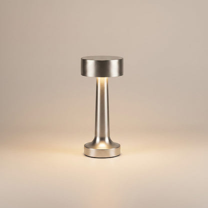 Lysverden brushed aluminum cordless disc-top table lamp with 4 color temperatures and Qi charging.
