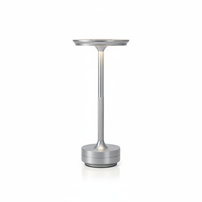 Lysverden cordless table lamp in brushed aluminum with flat disc top and touch control. 3 color temperatures.