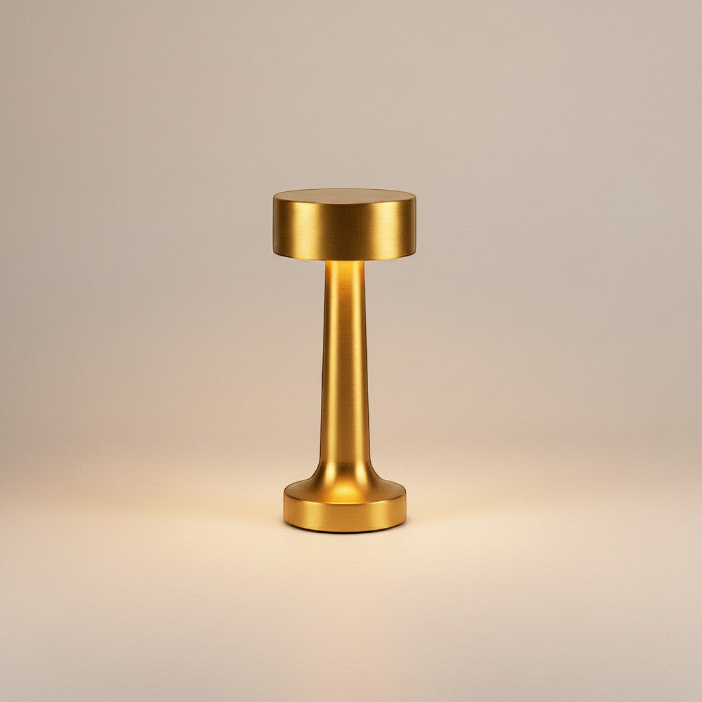 Lysverden brushed aluminum cordless table lamp with disc top and 4 color temperatures. Touch-controlled with a silicone base.